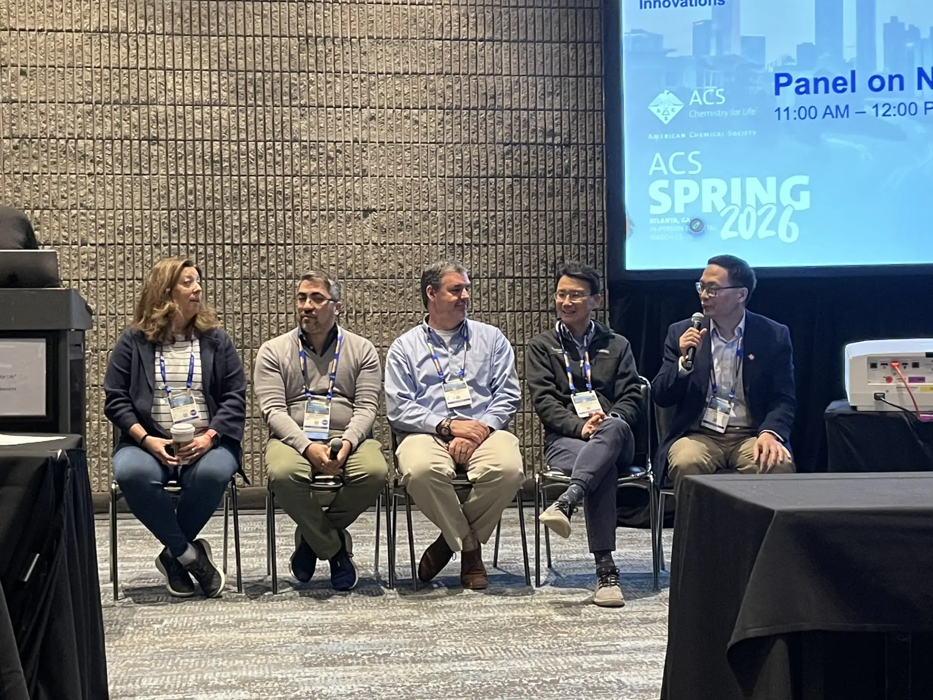 Five panellists seated on stage in front of a slide reading ACS Spring 2026, Atlanta.